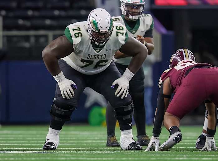 DeSoto's Byron Washington (76) stars down a Summer Creek DL in the UIL 6A Division II state championship.